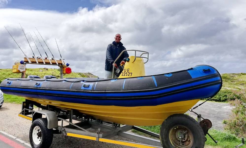 Family boat fishing trip in Cape Town on a sunny day